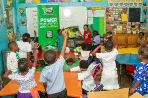 excited children in a classroom